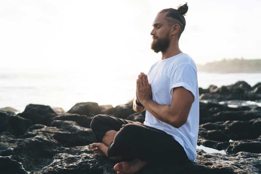 Man experiencing the benefits of holistic therapy