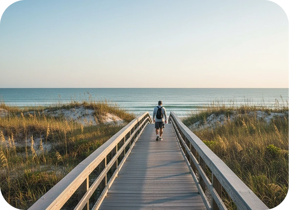 A person on a bench on a beach